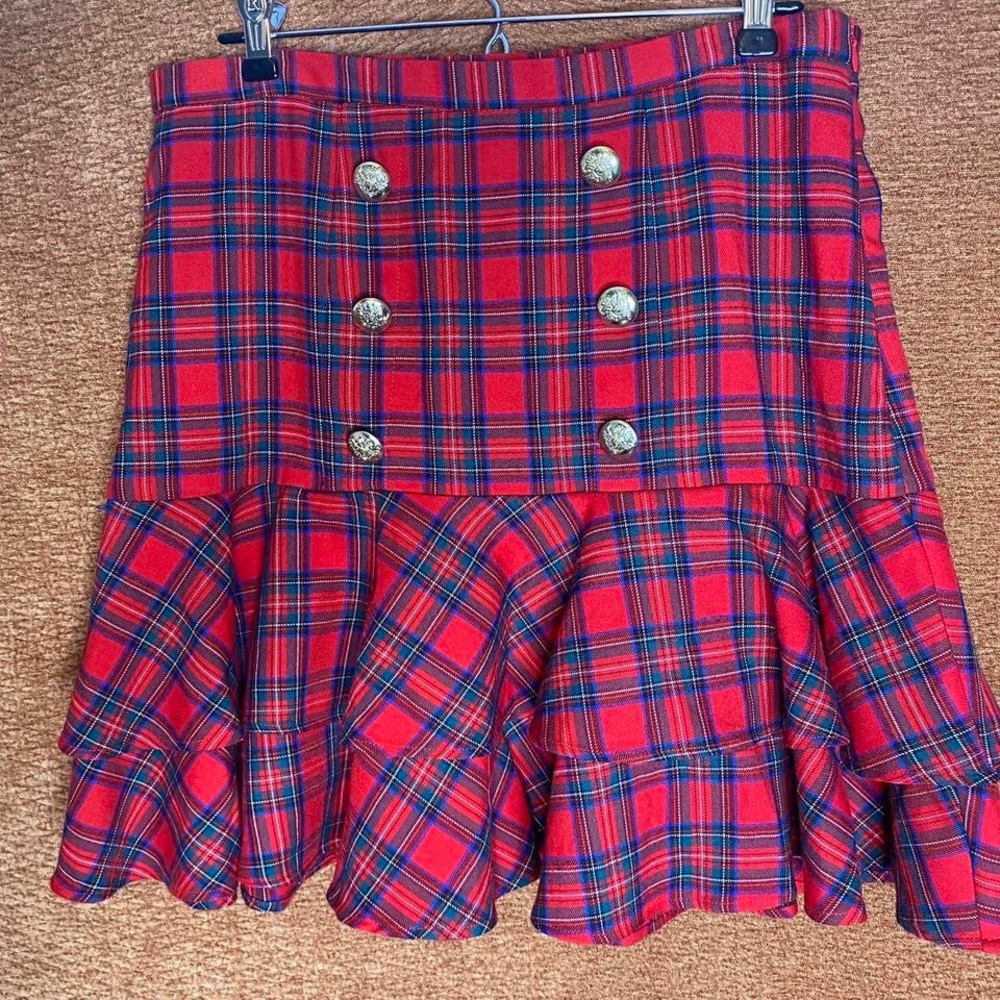 Red plaid layered miniskirt, size 10.